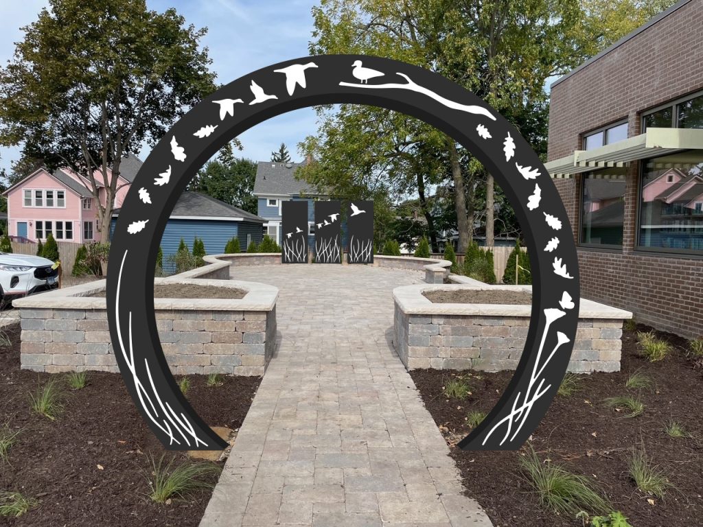 a mockup photo of a circle cut off at the bottom with the silhouettes of birds flying, leaves, and grass arching over a path. Further back is three panels depicting similar flying birds and grass