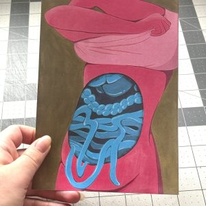 hand holding a 5x7 print of an illustration of a pink body pulling up a shirt to reveal blue organs spilling out